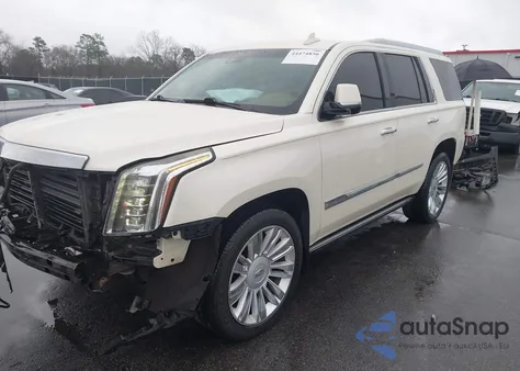 2015 Cadillac Escalade Platinum z USA, uszkodzony, nr VIN 1GYS4PKJXFR594090